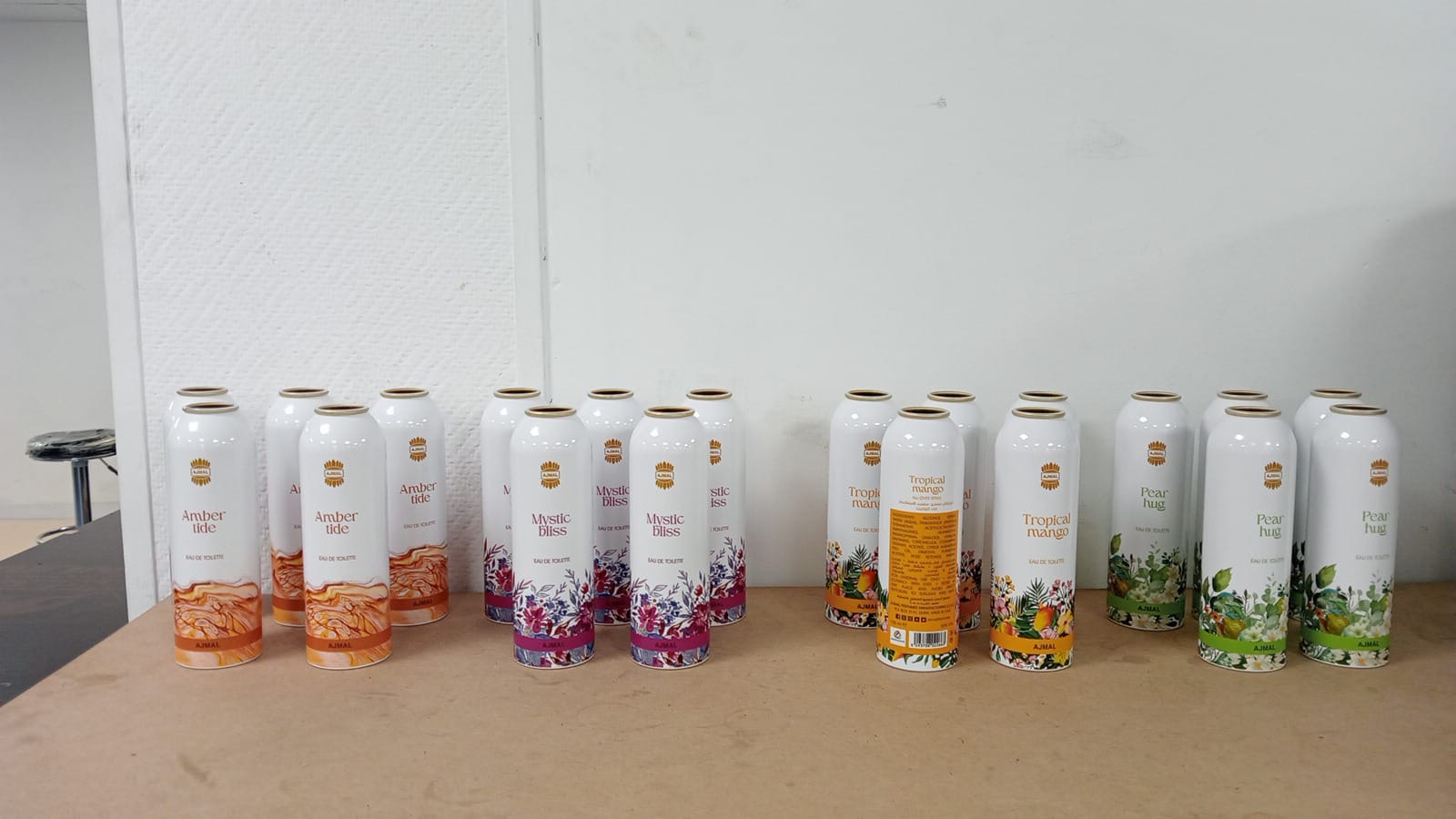 Ajmal Perfumes body spray cans printed full wrap directly onto the aluminium