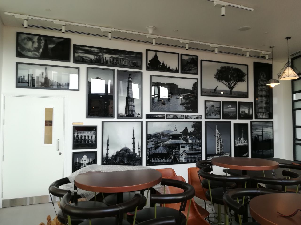 Office gallery wall — Reverse printing on acrylic, hung salon style