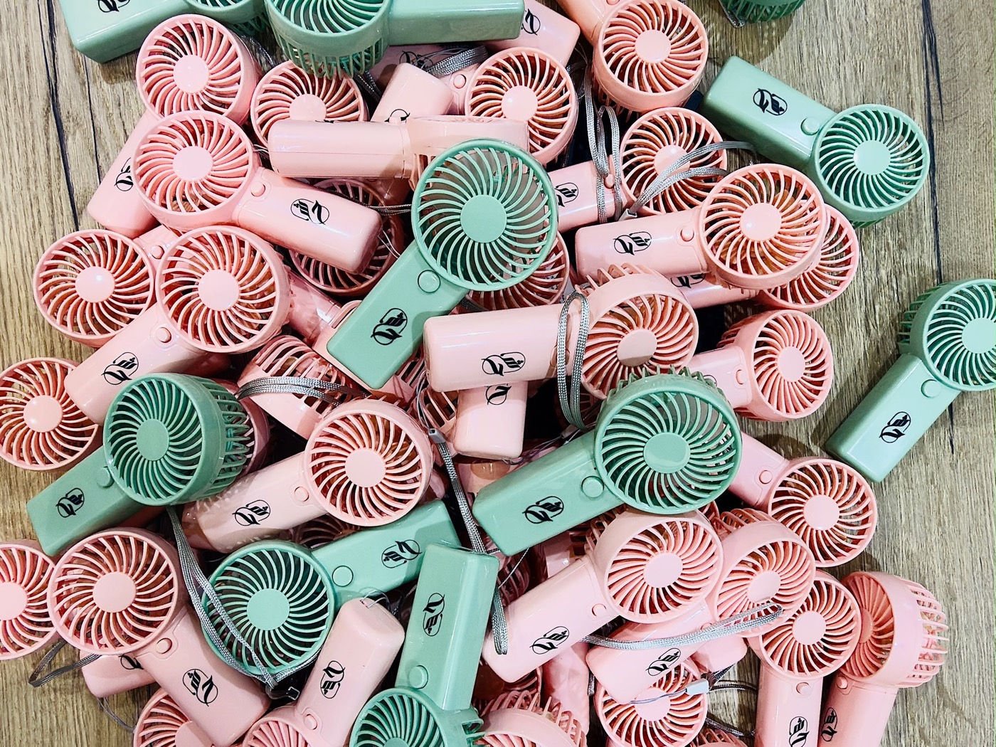 Lamatna — Printing on plastic fans, one per guest at a Dubai wedding