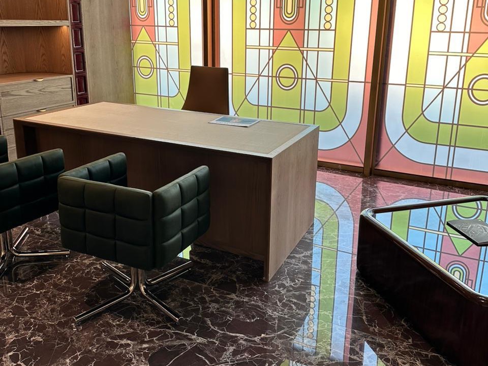 Layered geometric pattern printed onto full-height office glazing