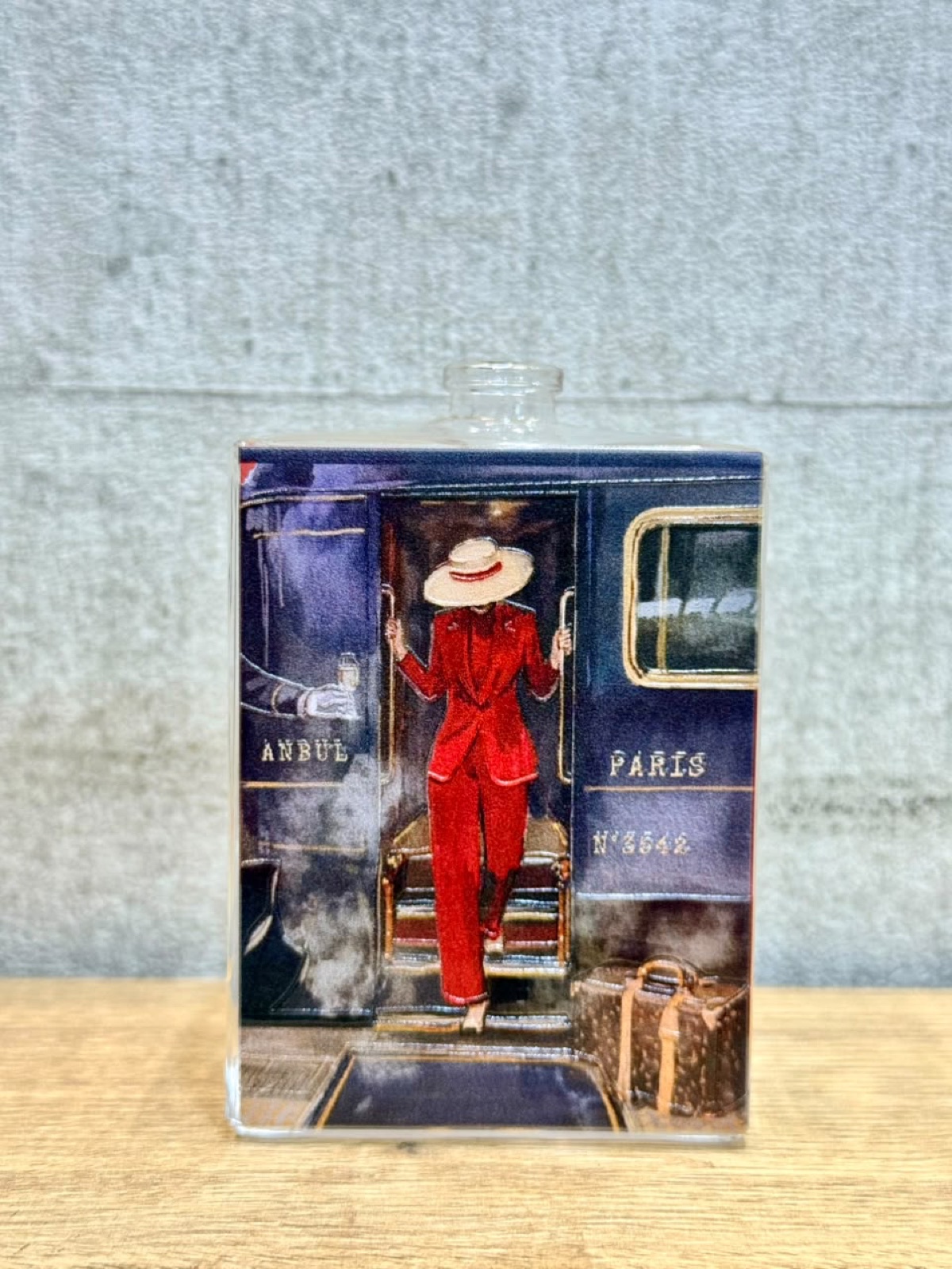 A perfume bottle printed direct onto the glass at Sun Studio Dubai