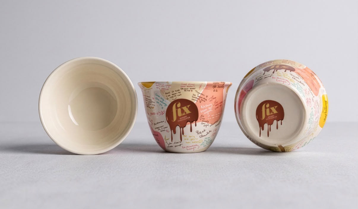 Three Fix Dessert Chocolatier qahwa cups printed with handwritten customer messages, shown upright, inverted and from inside