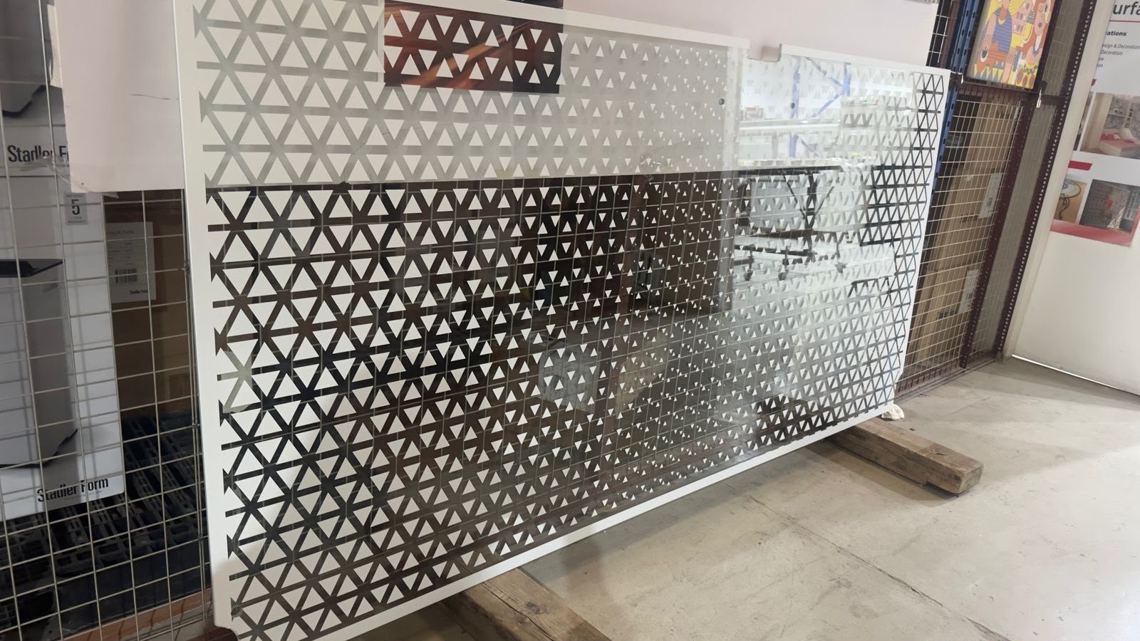 UV printing on glass partitions in a Dubai office for privacy and branding