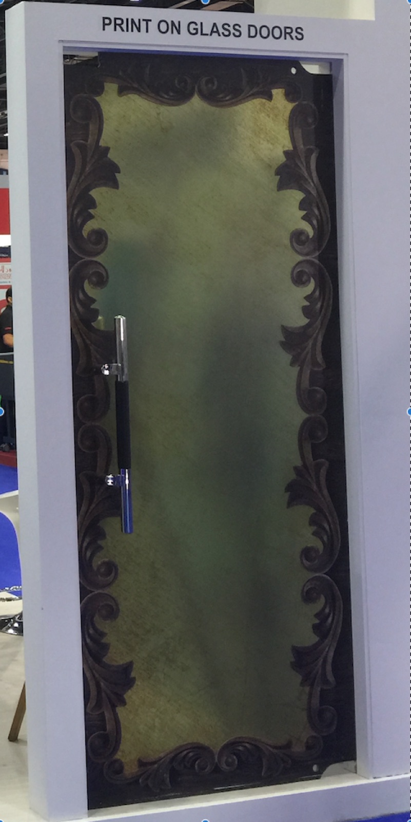 A glass door printed edge to edge with an ornamental design