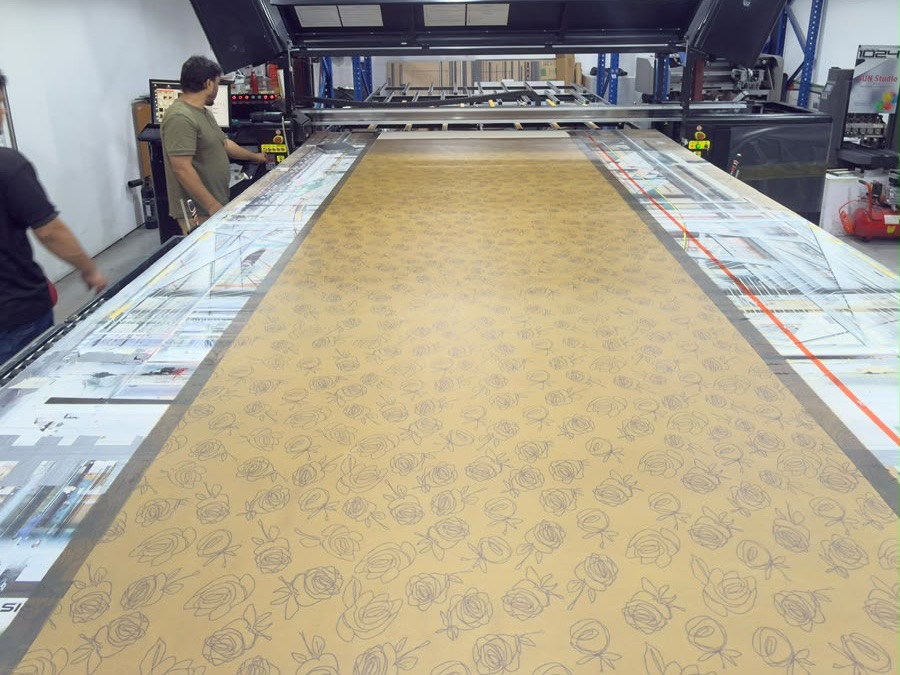 Leather being printed on the flatbed press at Sun Studio Dubai