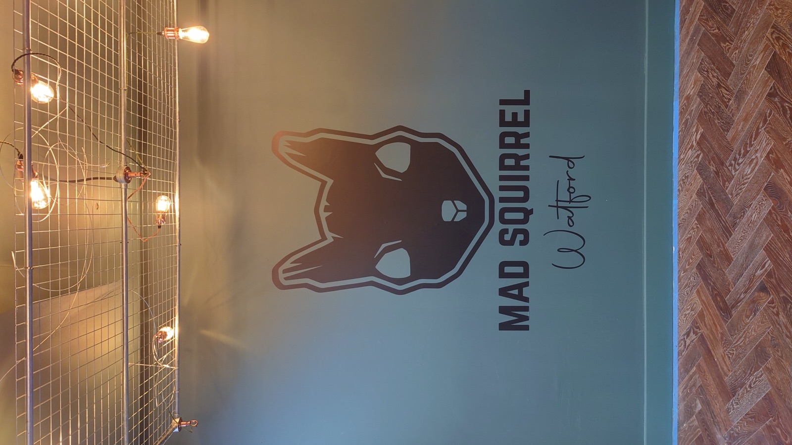 Wall printing Dubai for retail branding, a full-height mural printed in place