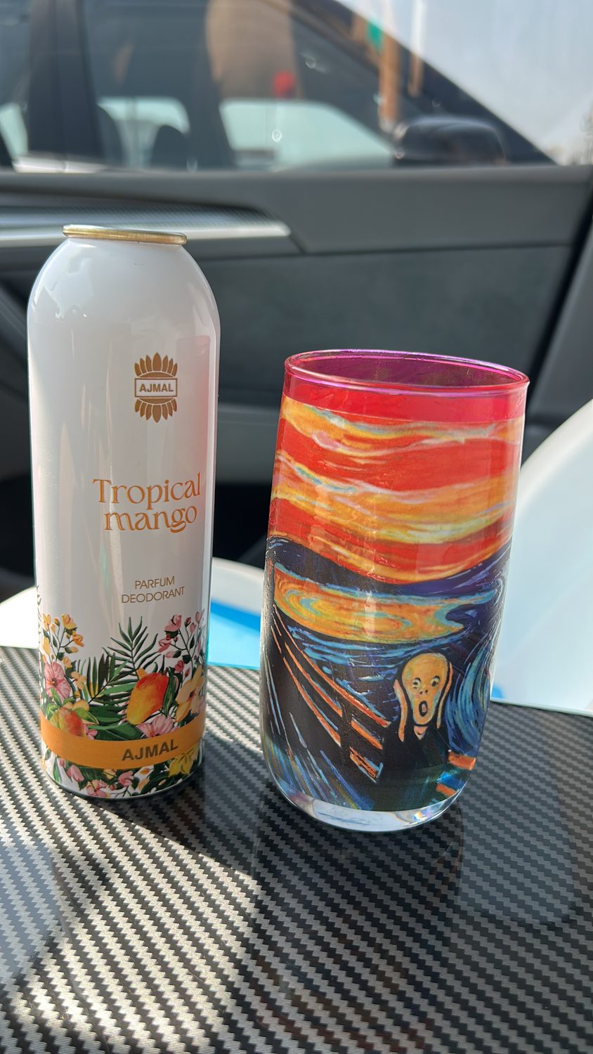 Aluminium body spray cans printed direct in full colour at Sun Studio Dubai